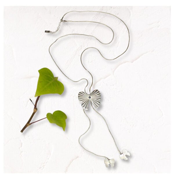 Silver bow tassel necklace