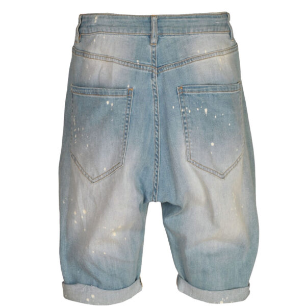 Splatter paint torn denim pants