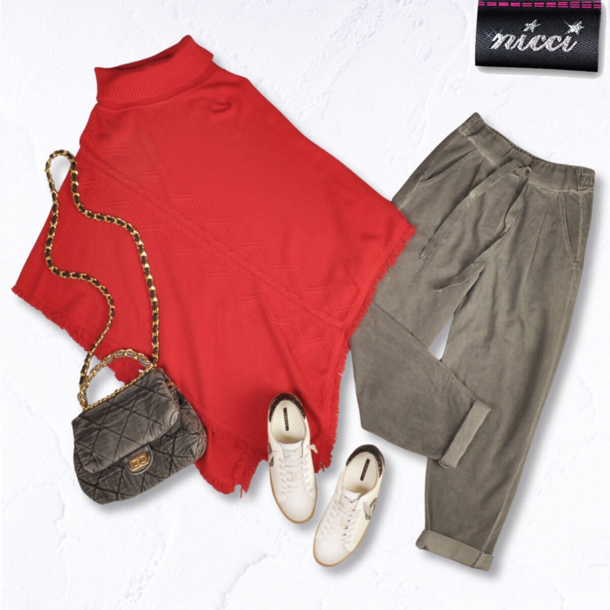 Asymmetrical fringe poncho