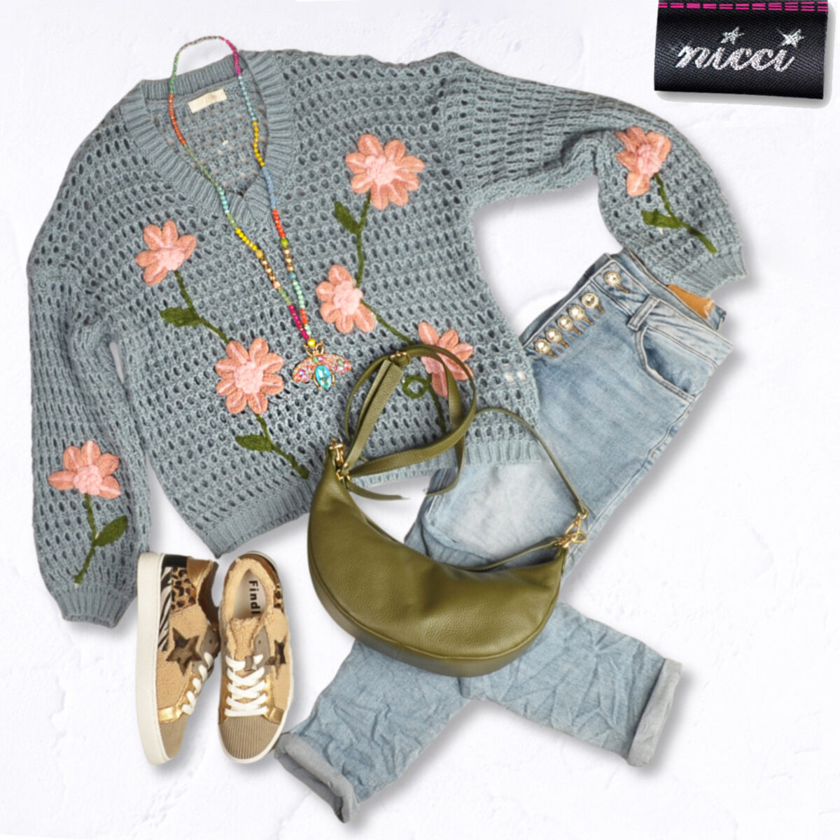 Holey flower knit top