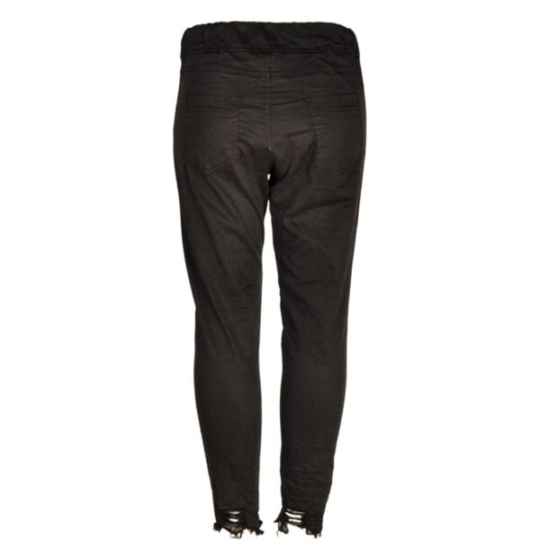 Raw hem torn pants