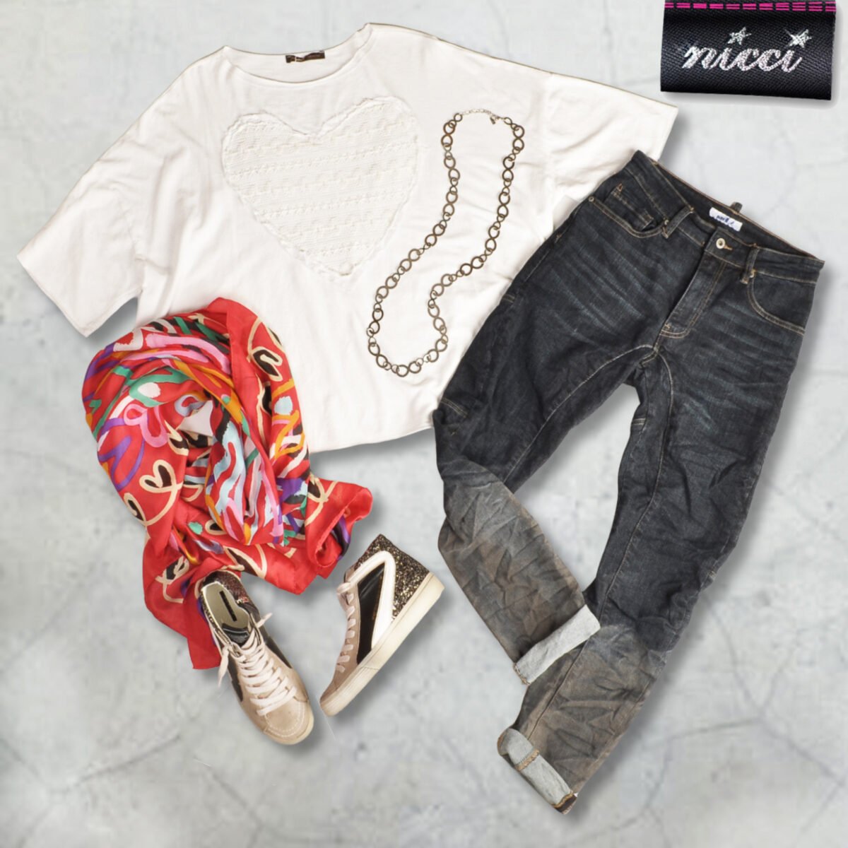 Raw-edge crochet heart oversized top
