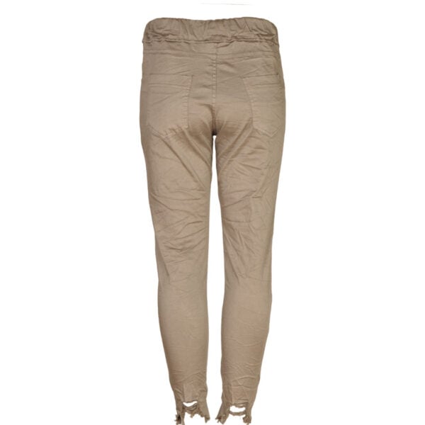 Raw hem torn pants